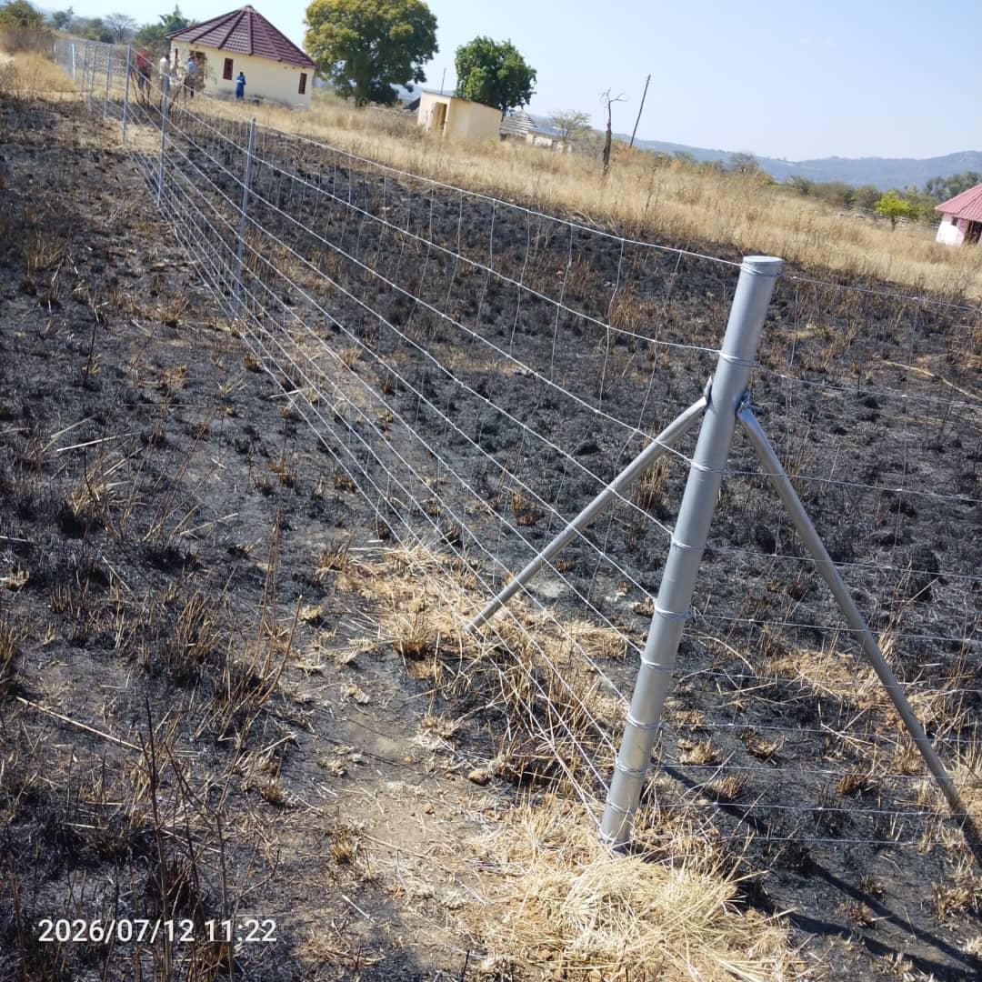 Real Azzar field fence installation on rural land